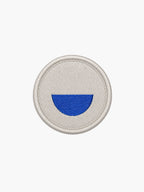 gray smiley patch