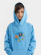 Kid wearing the Freaky Friends patch set on a Hahaha tee