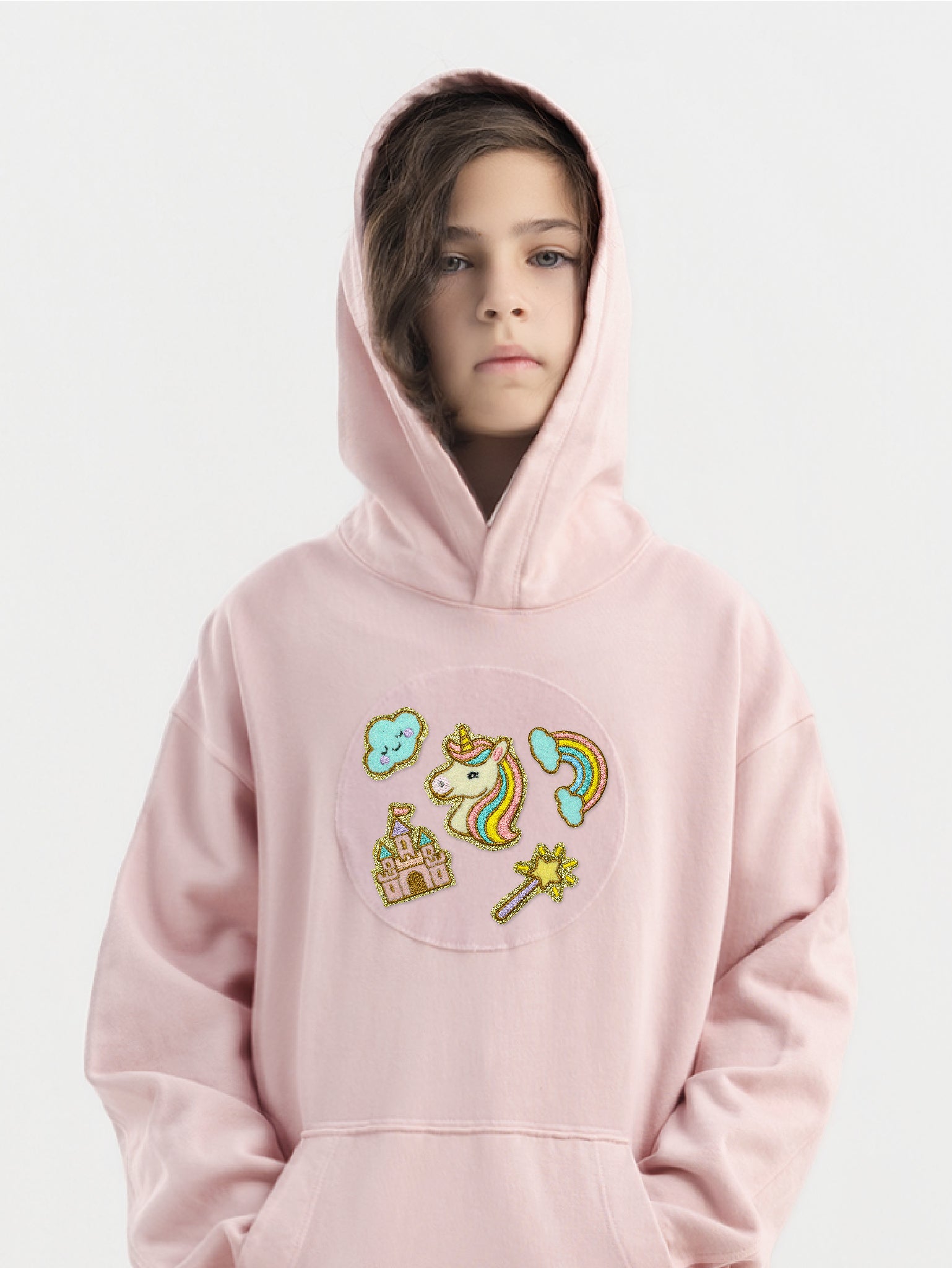 Kid wearing the Unicorn Dreams patch set on a Hahaha tee