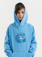 Kid wearing the Snowy Winter patch set on a Hahaha tee