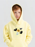 Kid wearing the Spooky Halloween patch set on a Hahaha tee