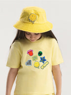 Kid wearing the Born to Rock patch set on a Hahaha tee