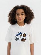 Kid wearing the Armenian Heritage patch set on a Hahaha tee
