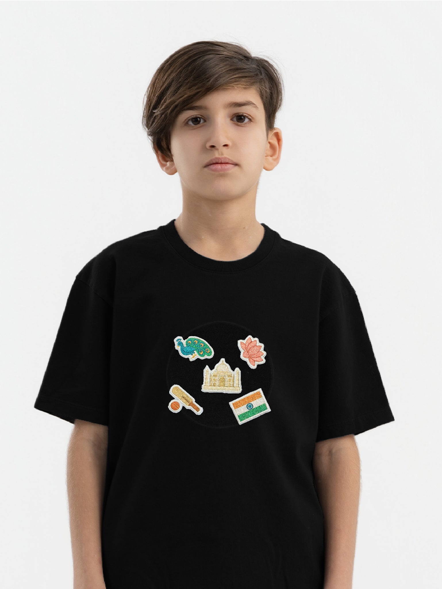 Kid wearing the Indian Traditions patch set on a Hahaha tee
