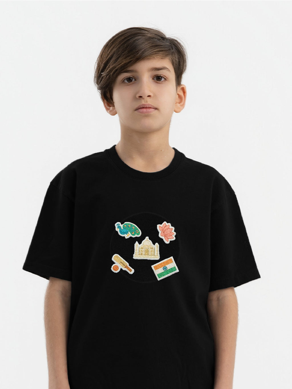 Kid wearing the Indian Traditions patch set on a Hahaha tee