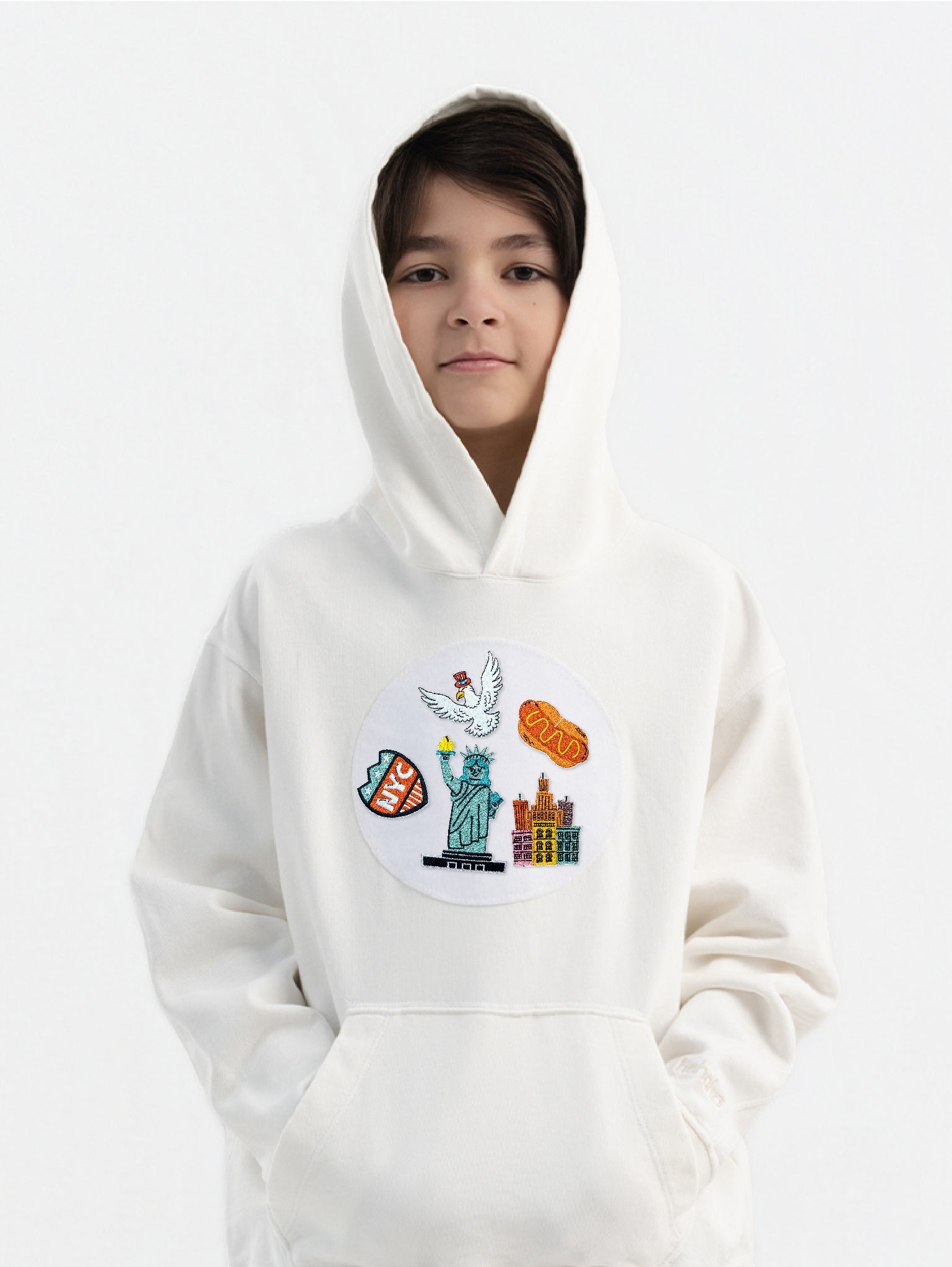 Kid wearing the American Spirit patch set on a Hahaha tee