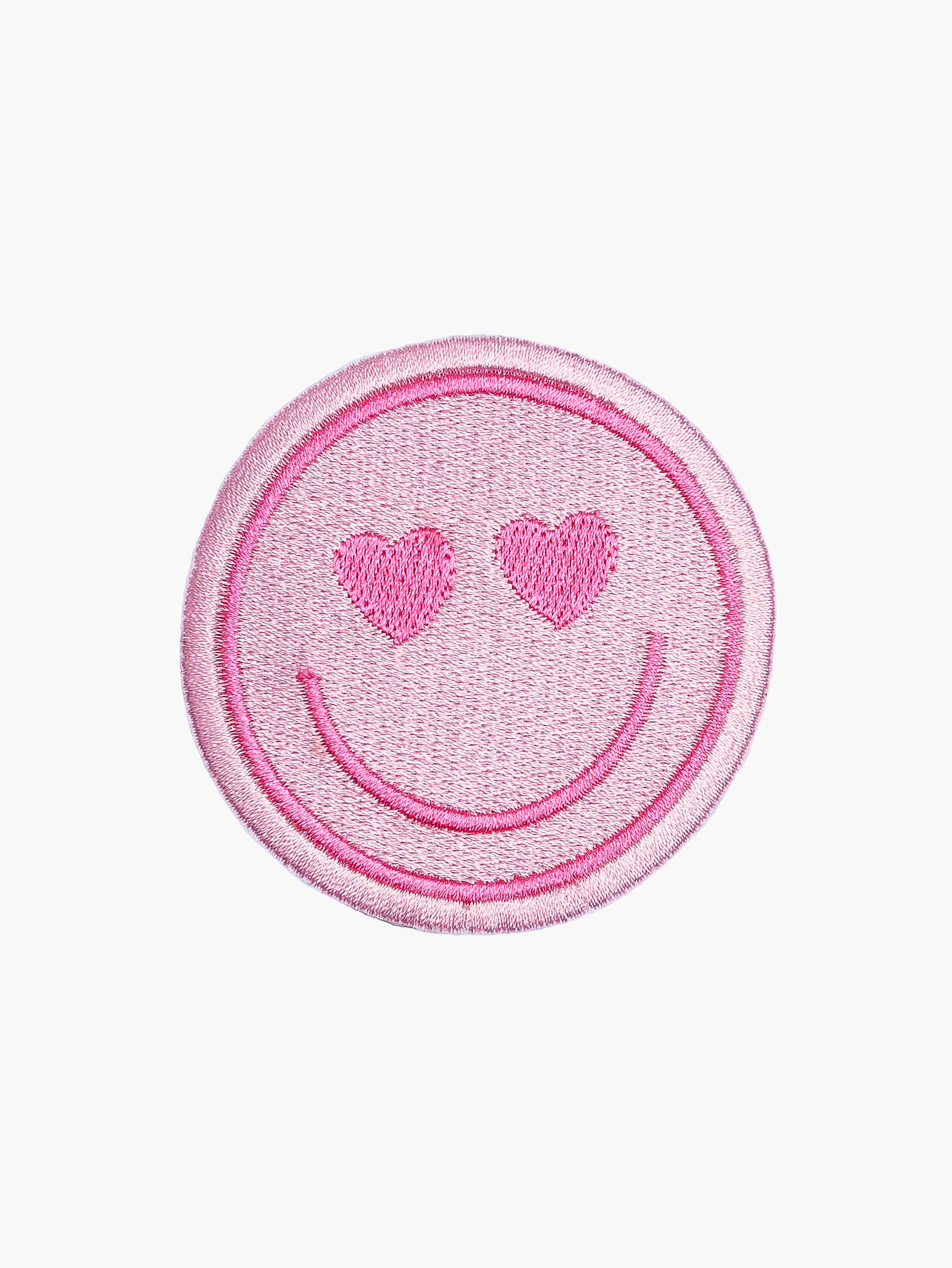 Embroidered Heart Eyes Smiley patch with hook-and-loop backing
