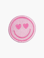 Embroidered Heart Eyes Smiley patch with hook-and-loop backing