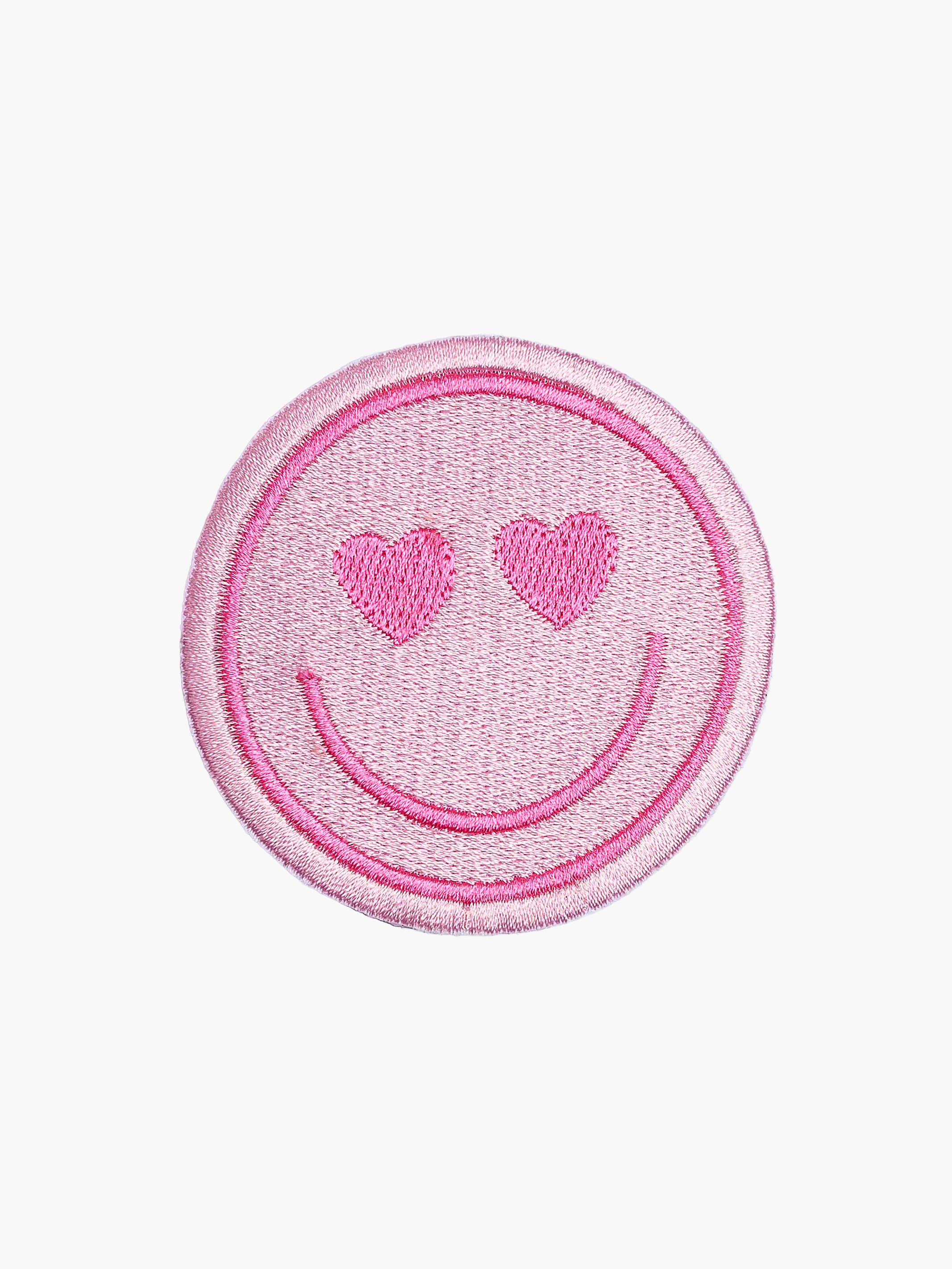 Embroidered Heart Eyes Smiley patch with hook-and-loop backing