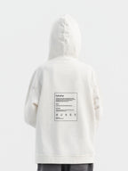 Back of off white Hahaha kids hoodie with CAUTION CONTAINS HIGH LEVELS OF SNUGGLES AND GIGGLES label