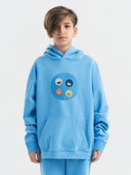 Kid wearing the Hahaha Emblem patch set on a Hahaha tee