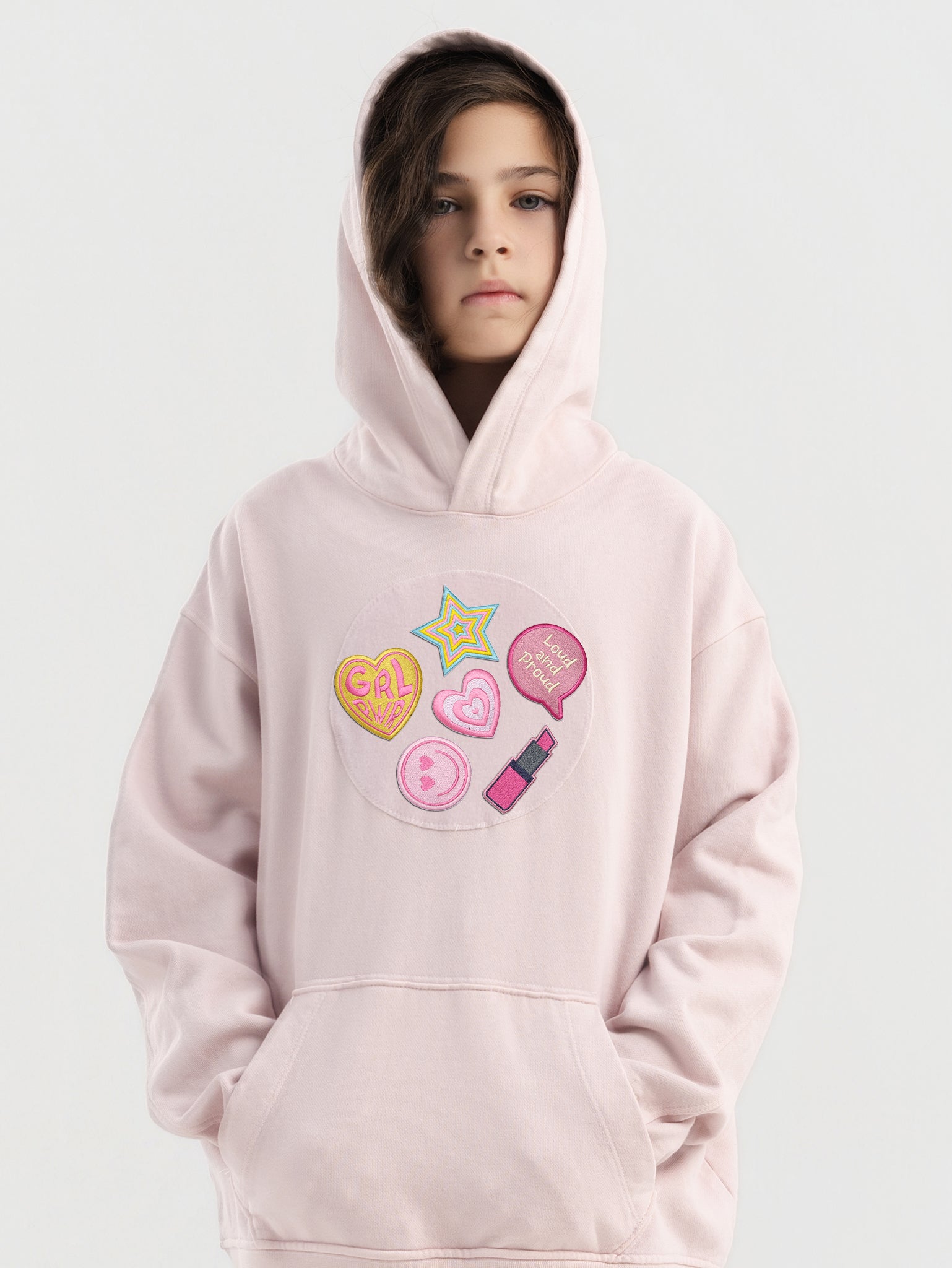 Close-up Hahaha embroidery on organic cotton kids hoodie cuff, handmade in Los Angeles