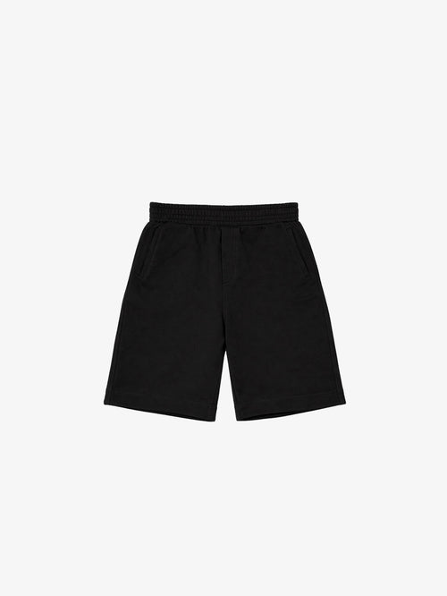 Black GOTS organic cotton kids shorts, flat front view on ghost mannequin