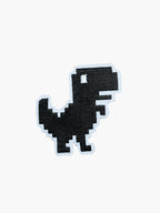 Embroidered Black Pixel T-Rex patch with hook-and-loop backing